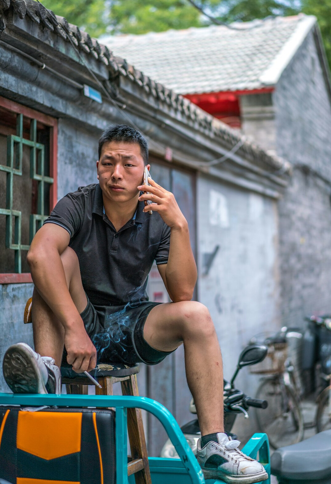 Studio portrait of a Chinese Singaporean male fitness coach